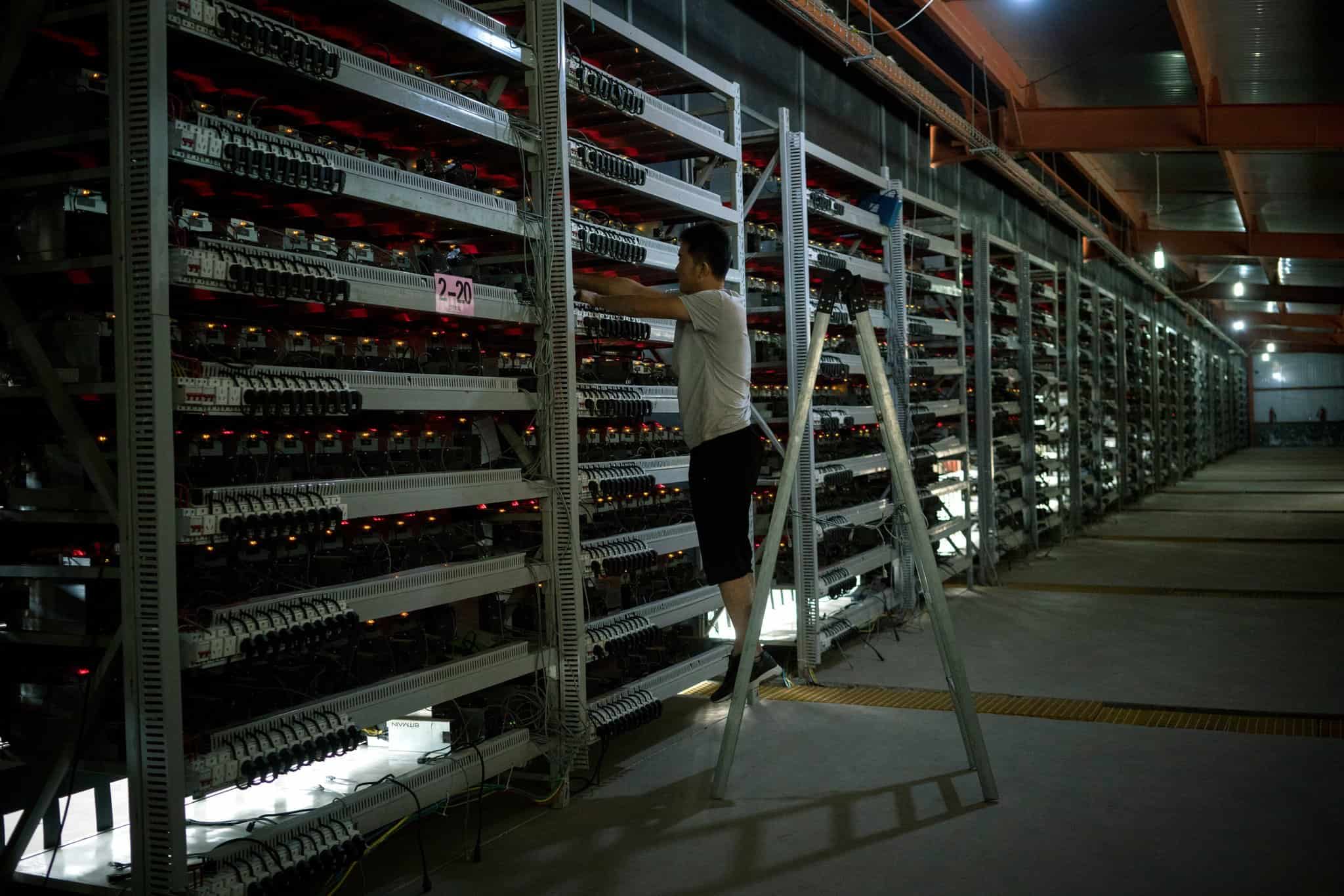 China's Hinterlands, Workers Mine Bitcoin 