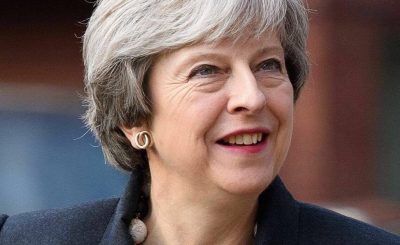 UK's May Fires Defence Minister